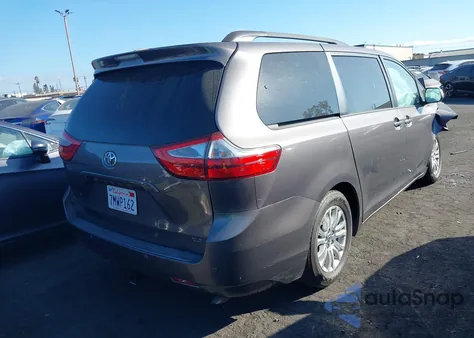 2015 Toyota Sienna Xle Premium 8 Passenger z USA, uszkodzony, nr VIN 5TDYK3DC5FS639760